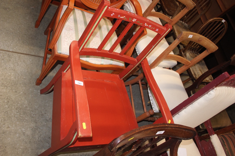 A floral decorated commode chair