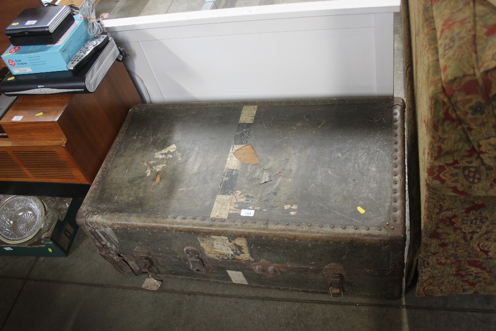 A metal bound travelling trunk