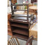 An oak effect open fronted bookcase