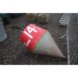 A red and green buoy