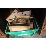 A box of various pictures and prints