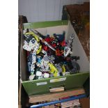 A box of mostly Lego figures