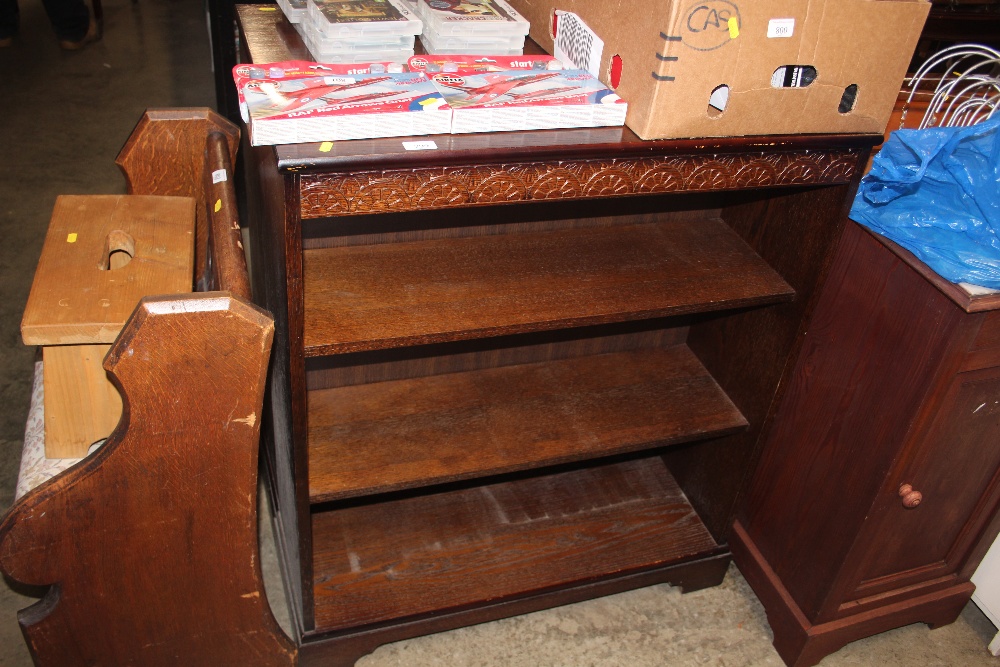 A pair of oak effect open fronted bookcases