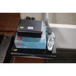A Sky box together with a Freeview box etc.