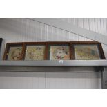 Four framed embroideries depicting farm scenes