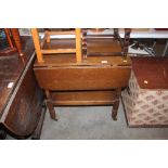 An oak drop leaf two tier trolley