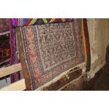 An approx. 5ft 6ins x 3ft Eastern pattern rug