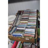 A box of various CDs