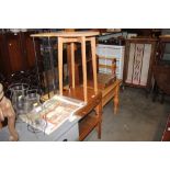 A circular top table together with a teak bedside