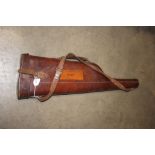 A leather Leg of Mutton gun case