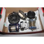 A box containing two multiplier fishing reels and