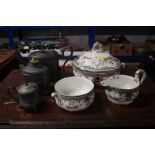 A Royal Doulton tureen and cover with matching jug