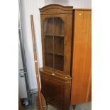 A veneer corner cabinet