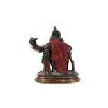 A Vienna style bronze figure of Bedouins, with a camel, 20cm high