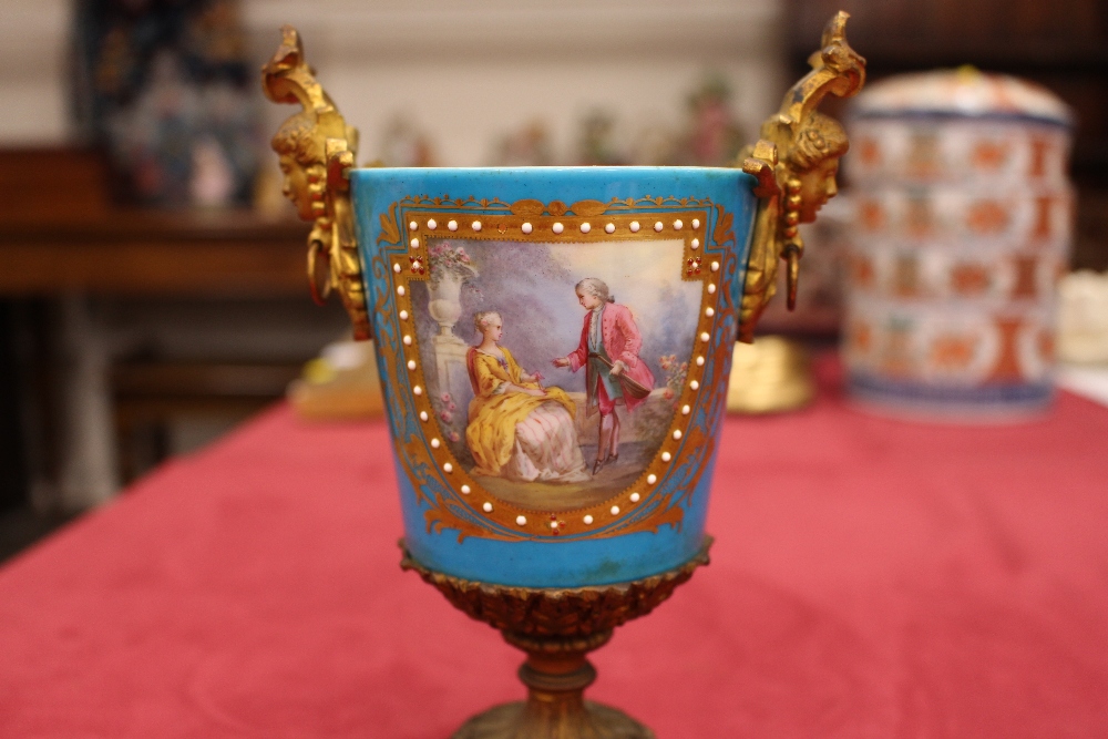 A pair of 19th Century Sevres style gilt metal mounted urns and covers, surmounted by foliate and - Image 15 of 19