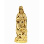 An oriental carved ivory figure of a maiden holding a scroll, mother of pearl and coloured stone