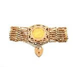 A 9 carat gold gated bracelet, inset with a 1913 sovereign, total weight approx. 29.5gms