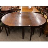 A George III mahogany D end dining table, having later centre leaf, raised on square section