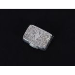 A small Victorian silver vinaigrette, having finely chased decoration, maker Francis Clark,
