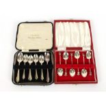 A cased set of six silver coffee spoons, with Prince of Wales plume terminals; seven various cased