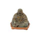 A Chinese bronze figure of a seated Buddha, 14cm high