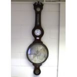 A large mahogany wheel barometer, by Tarell, Northampton, fitted with a fuse clock by Durrant