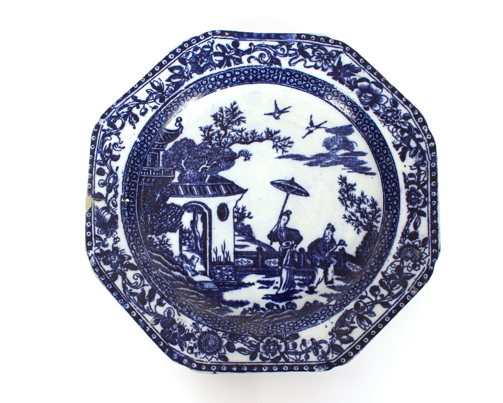 A pair of 18th Century Caughley style octagonal blue and white plates, decorated in the Chinese