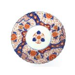 A pair of Imari chargers, having scalloped borders, decorated in the traditional  manner and