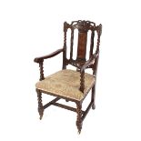 A set of 14 19th Century Edwards & Roberts carved oak dining chairs