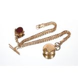 A 9 carat gold Albert with T bar and swivel fob, set with agate stone, approx. 28gms total weight;