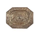 A large ornate silver plated 19th Century dish, decorated with cherubs and foliate scrolls with a