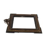 A Victorian ebonised and gilt decorated wall mirror, 73cm x 59cm