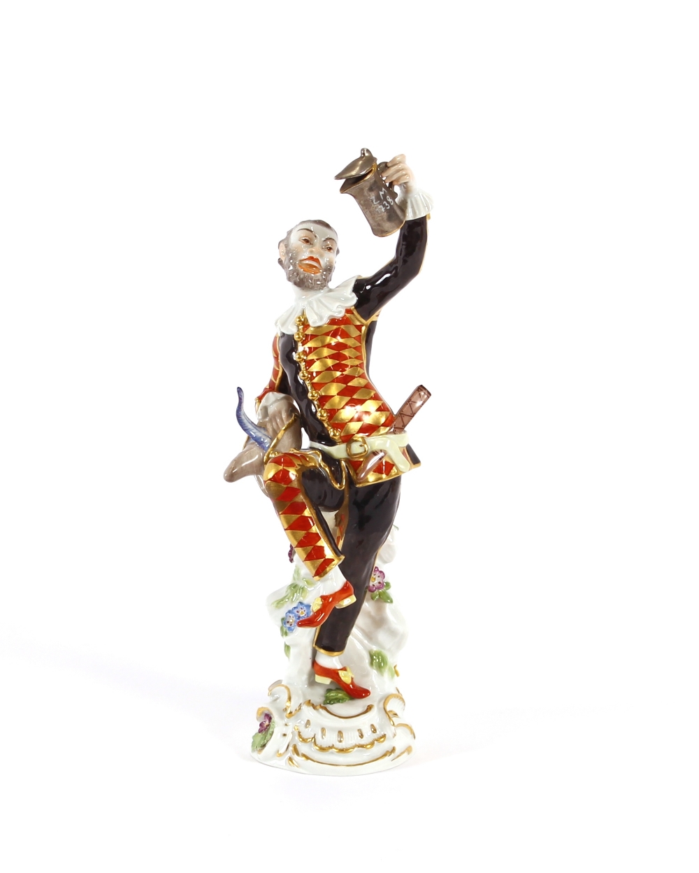 A Meissen harlequin figure, 23cm high