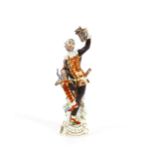 A Meissen harlequin figure, 23cm high