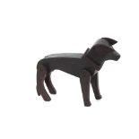 An early 20th Century folk art treen model of an articulated Circus Terrier dog, with adjustable