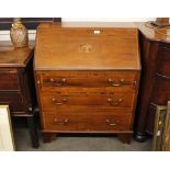 An Edwardian inlaid mahogany and satinwood cross-banded bureau, the fall front opening to reveal a