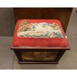 A 19th Century mahogany ottoman, needlepoint upholstered seat decorated pheasant in landscape,