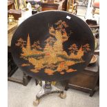 A 19th Century black and red lacquered chinoiserie decorated snap top occasional table, raised on