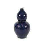 A Chinese porcelain blue double gourd shaped vase