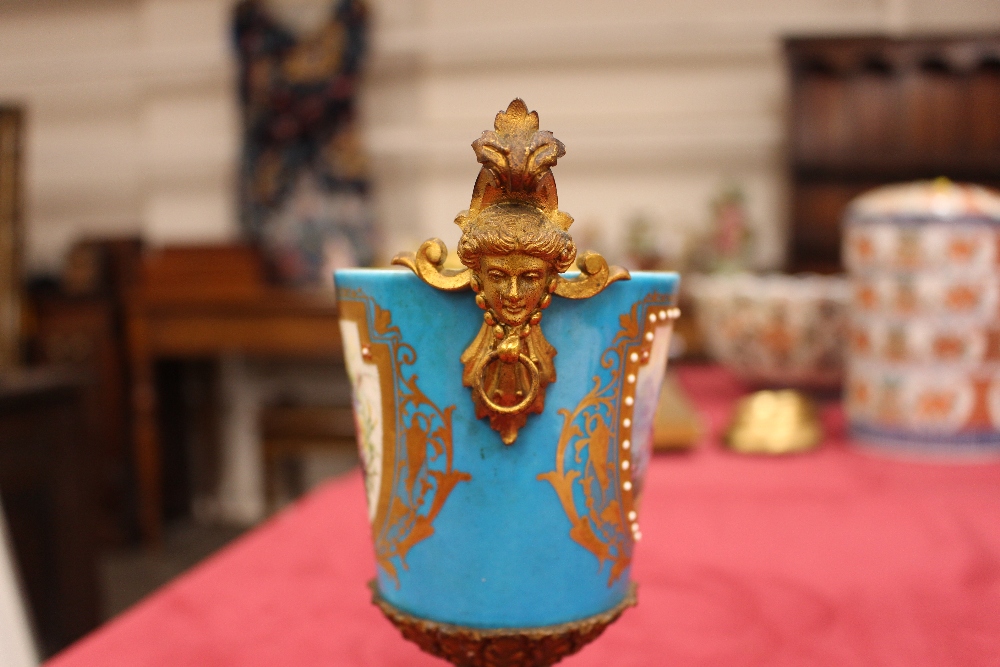 A pair of 19th Century Sevres style gilt metal mounted urns and covers, surmounted by foliate and - Image 7 of 19