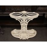 A Victorian cast iron stick stand, having pierced floral and fruit decoration, 65cm wide x 67cm