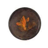 An oriental circular papier mache tray, decorated with a scene of a carp, 53.5cm dia.