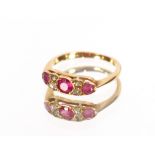 A yellow metal ruby and diamond set ring