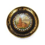 A pair of decorative papier mache plates, with mother of pearl inlay depicting church exterior and