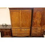 A 19th Century mahogany and satinwood cross-banded linen press, (converted to a hanging wardrobe),