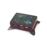 A cloisonne rectangular box and cover, decorated with flowers on a green and blue ground, 13cm