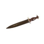 A German dagger, the blade inscribed "Karlburgs Muller, Berlin", complete with metal scabbard,