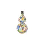 An oriental cloisonne double gourd shaped vase, with all over foliate decoration, 16cm high