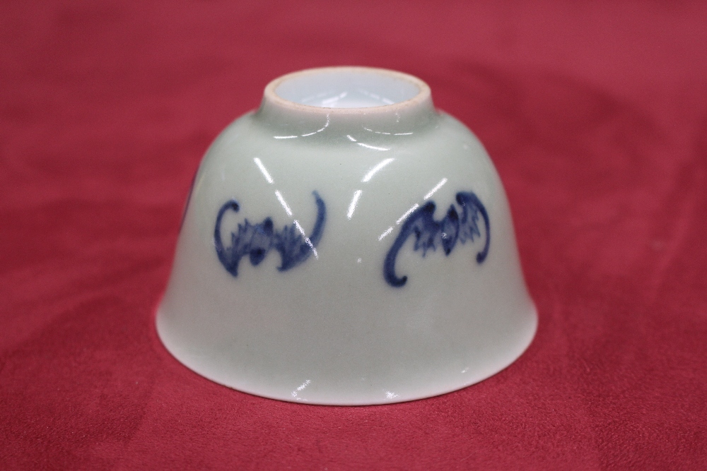 A small oriental celadon ground bowl, decorated with bats, character mark to base, 9cm dia. - Image 4 of 7