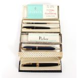Three boxed Parker pens